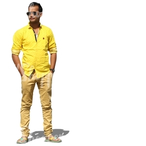 indian man in a yellow shirt standing