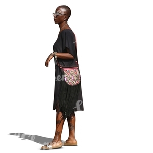 black woman in a black summer dress standing