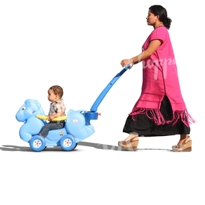 latina woman pushing a child in a toy carriage