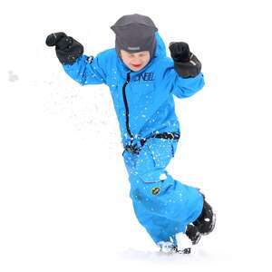 young boy playing in the snow