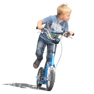 blond boy riding a scooter