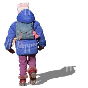 girl with a small backpack walking in autumn