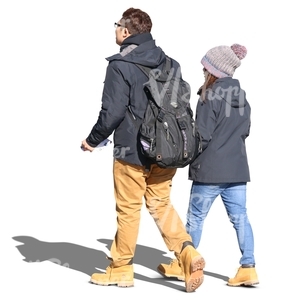 asian couple walking hand in hand in the autumn sun