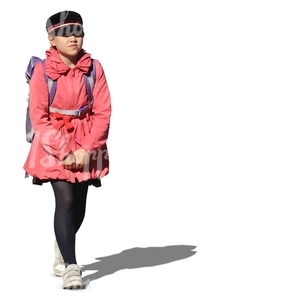 schoolgirl in a pink coat walking