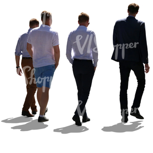 backlit group of four men walking