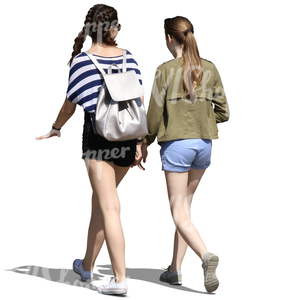 two teenage girls walking and talking