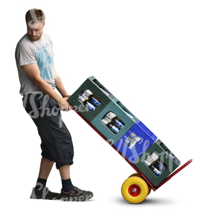 man pulling a pallet truck loaded with bottles