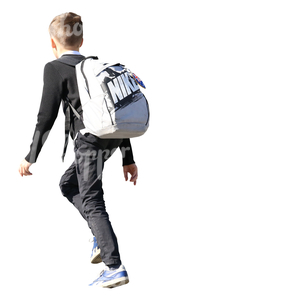 schoolboy with a backpack walking up the stairs