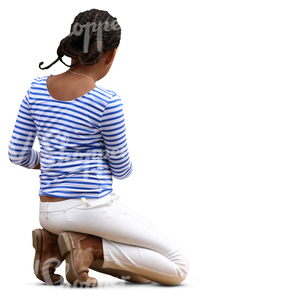 young black girl kneeling on the ground