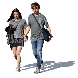 asian couple walking hand in hand