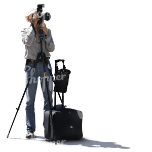 a photographer with a tripod taking a picture