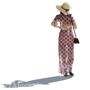 backlit asian woman in a summer dress walking