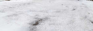 paved square covered in snow