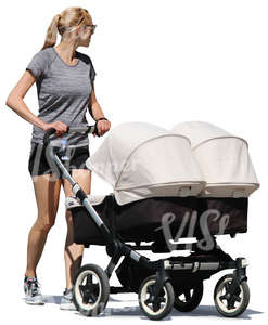 woman walking with a twins carriage