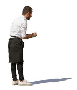 waiter standing and taking an order