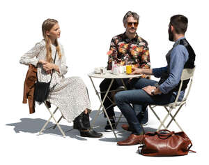 cut out cafe scene with three people sitting and talking