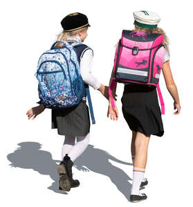 two cut out schoolgirls walking and talking