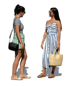 two cut out women standing and talking