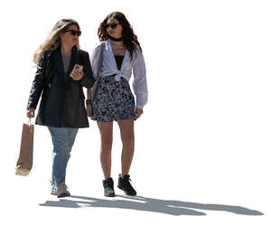 two cut out backlit girlfriends walking