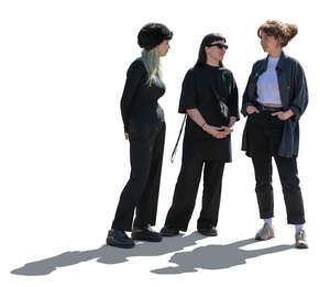 three cut out women in black standing