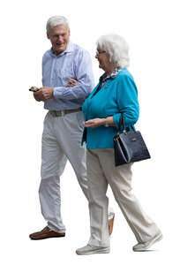 cut out grey haired couple walking arm in arm