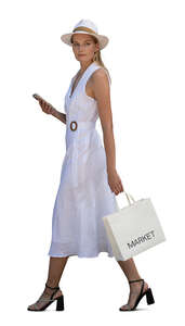 cut out chic woman in a white dress walking