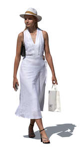 cut out woman in a white dress walking
