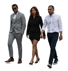 group of three people in formal style outfits walking