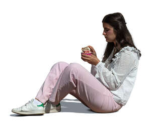 woman sitting and eating ice cream