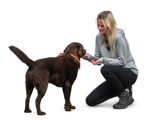 cut out woman squatting and petting her dog