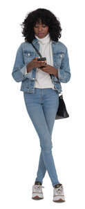 cut out young black woman standing and texting