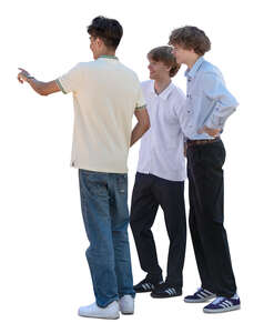 group of three teenage boys standing and pointing at smth