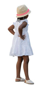 little black girl in a white dress standing