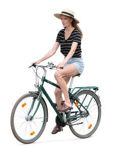 woman with a hat riding a bicycle