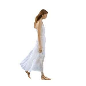 cut out video of a woman in a white dress walking with the wind blowing