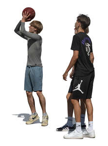 three cut out teenage boys playing basketball