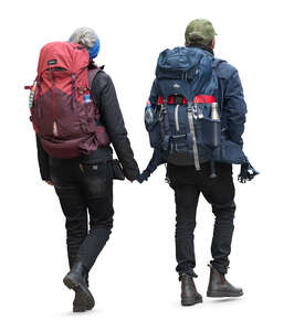 two people with big hiking backpacks walking