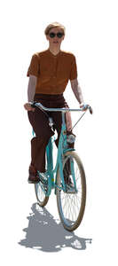 cut out backlit woman riding a blue city bike