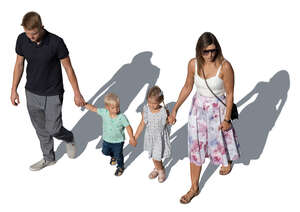 top view of a family walking hand in hand