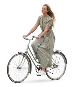 woman in a long dress riding a bike