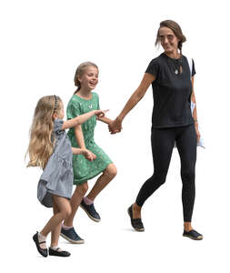 woman and two girls walking happily