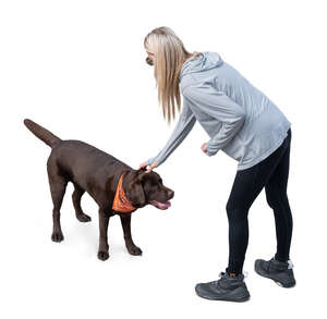 top view of a woman playing with her dog