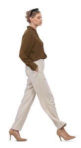 cut out woman walking hands in pockets