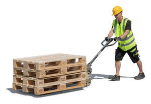 workman transporting pallets with a forklift