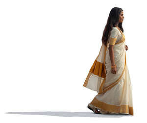 cut out indian woman in a traditional saree walking in side view