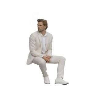 video of a man in a white suit sitting with alpha channel