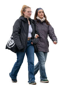 two women in autumn walking together