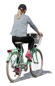 cut out woman riding a mint green bicycle