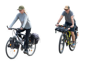 man and woman riding travel bikes