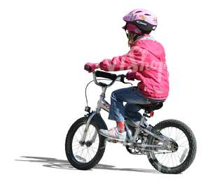 young girl with a helmet riding a bike